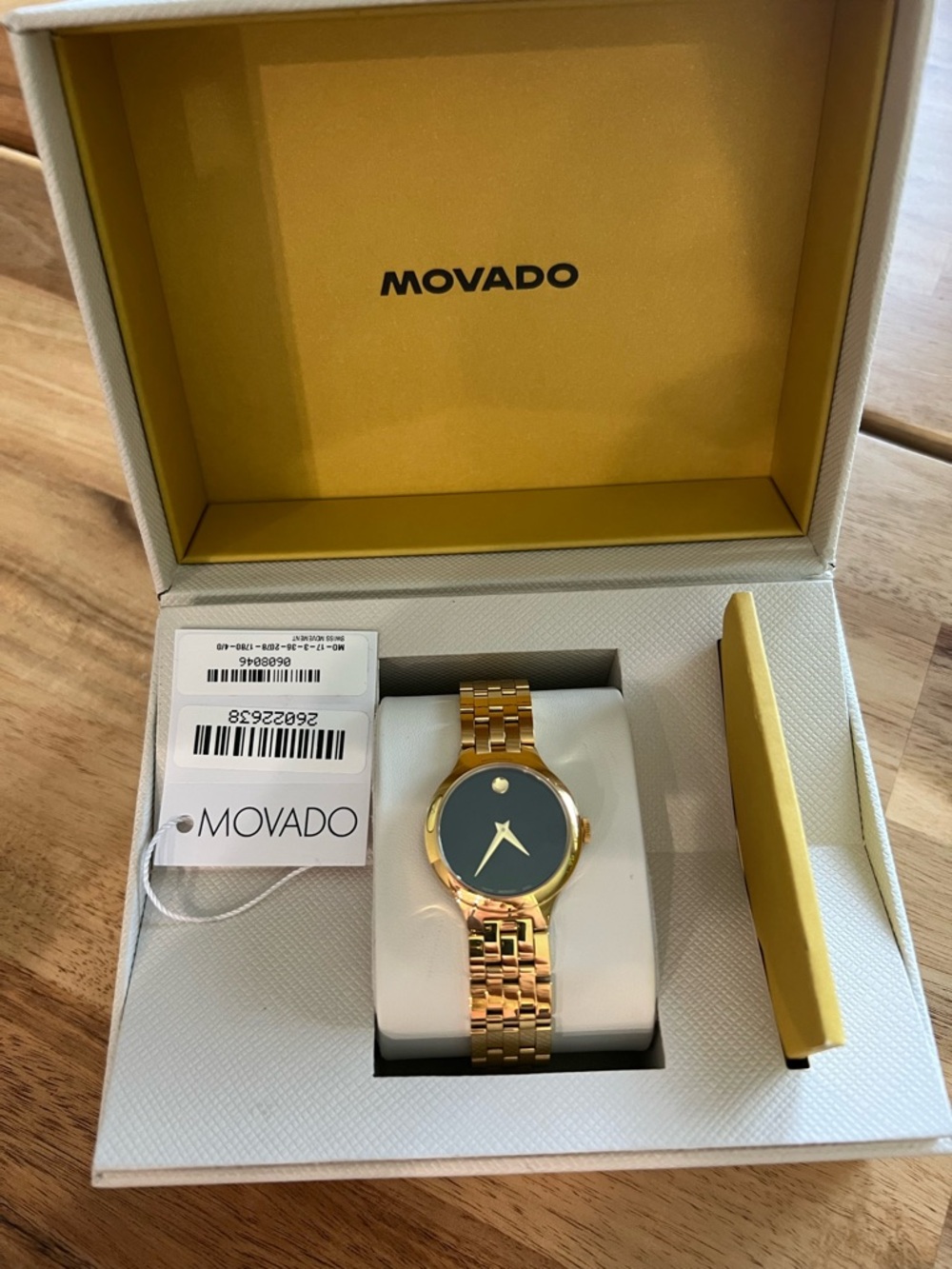 Movado Gold Tone Black Dial Women’s Bracelet Watch